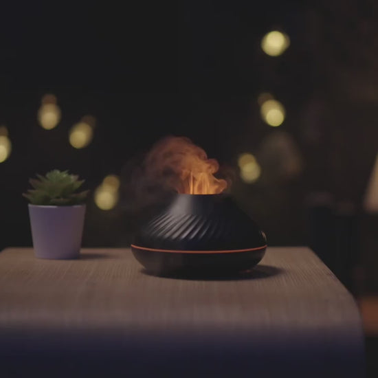 Soothing mist. Peaceful music plays. The oil sent wafts through the air. Panning across the table and by the books. To work in peace. To relax in a whole new way. What a way to transform the space with the 'Essential Oil Diffuser'.